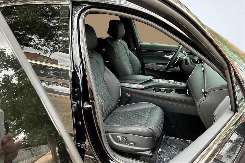 used 2025 Genesis GV70 car, priced at $56,495