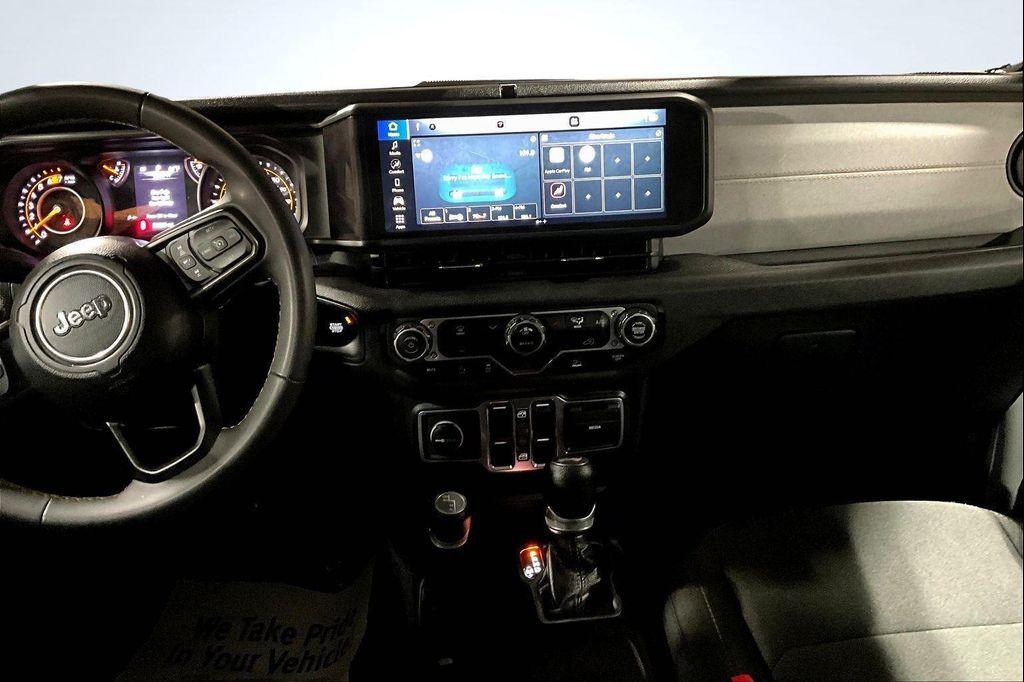 used 2024 Jeep Wrangler car, priced at $33,545