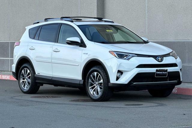 used 2016 Toyota RAV4 Hybrid car, priced at $16,580