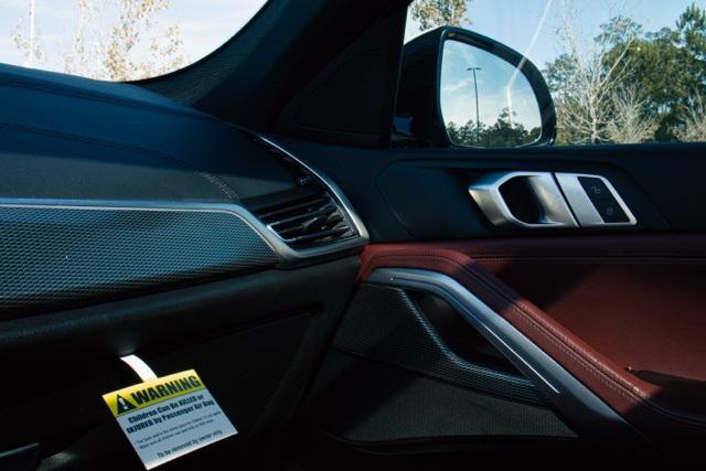 used 2021 BMW X6 car, priced at $47,011