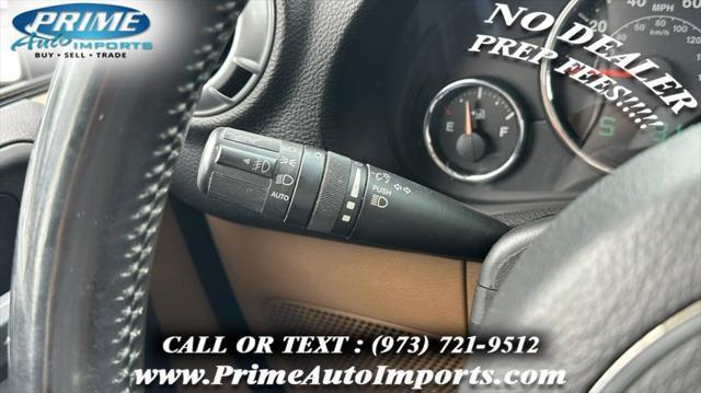 used 2013 Jeep Wrangler Unlimited car, priced at $12,490