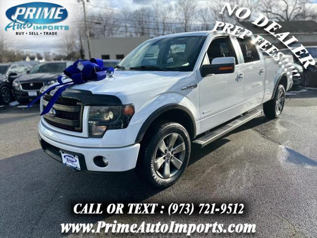 used 2014 Ford F-150 car, priced at $17,990