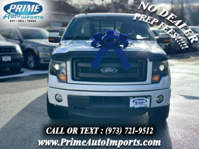 used 2014 Ford F-150 car, priced at $17,990