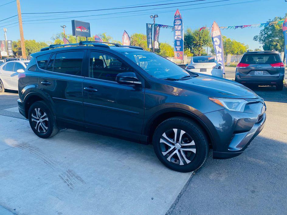 used 2018 Toyota RAV4 car, priced at $10,999