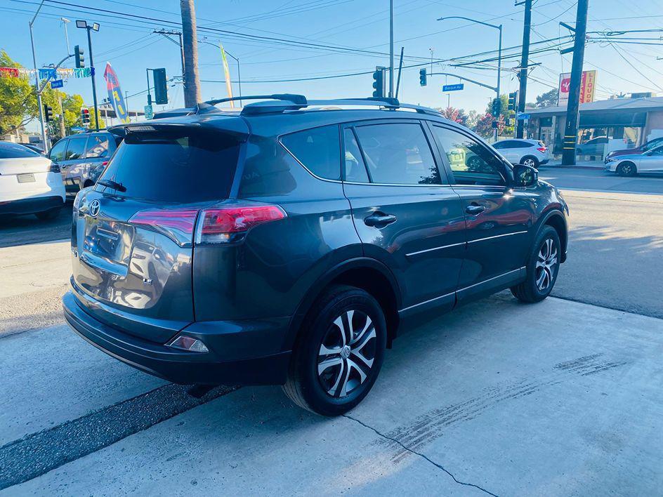 used 2018 Toyota RAV4 car, priced at $10,999