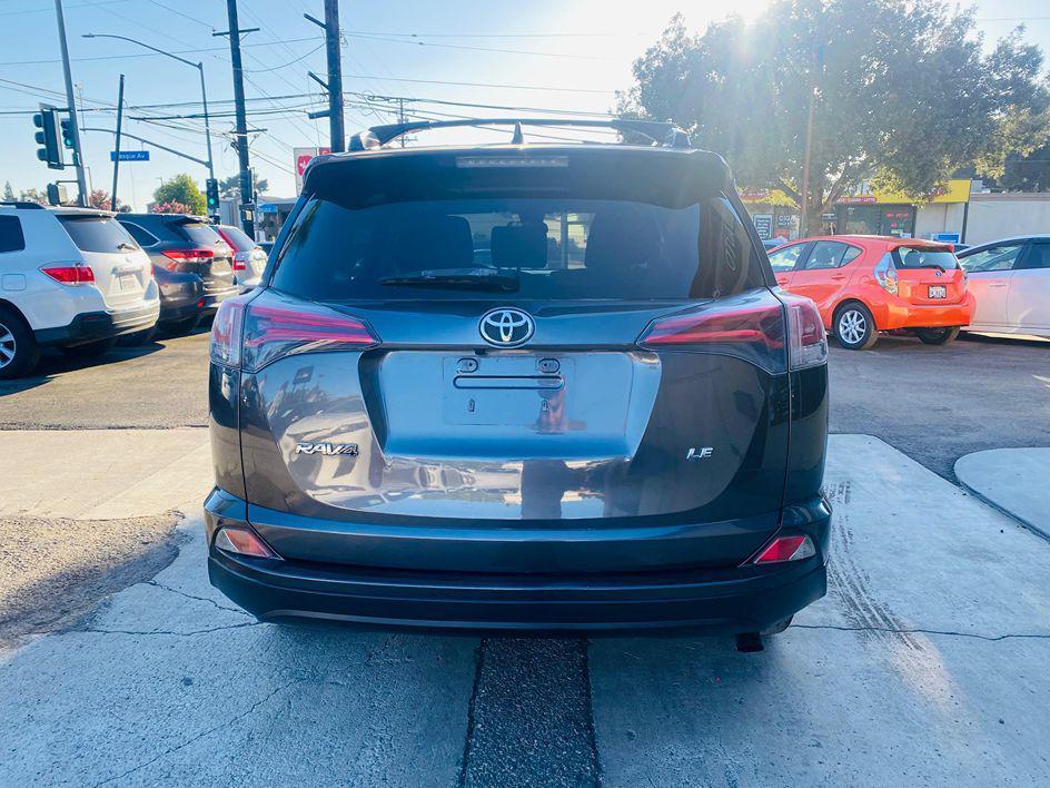 used 2018 Toyota RAV4 car, priced at $10,999