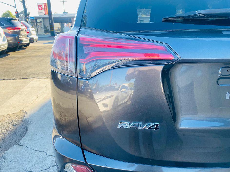 used 2018 Toyota RAV4 car, priced at $10,999