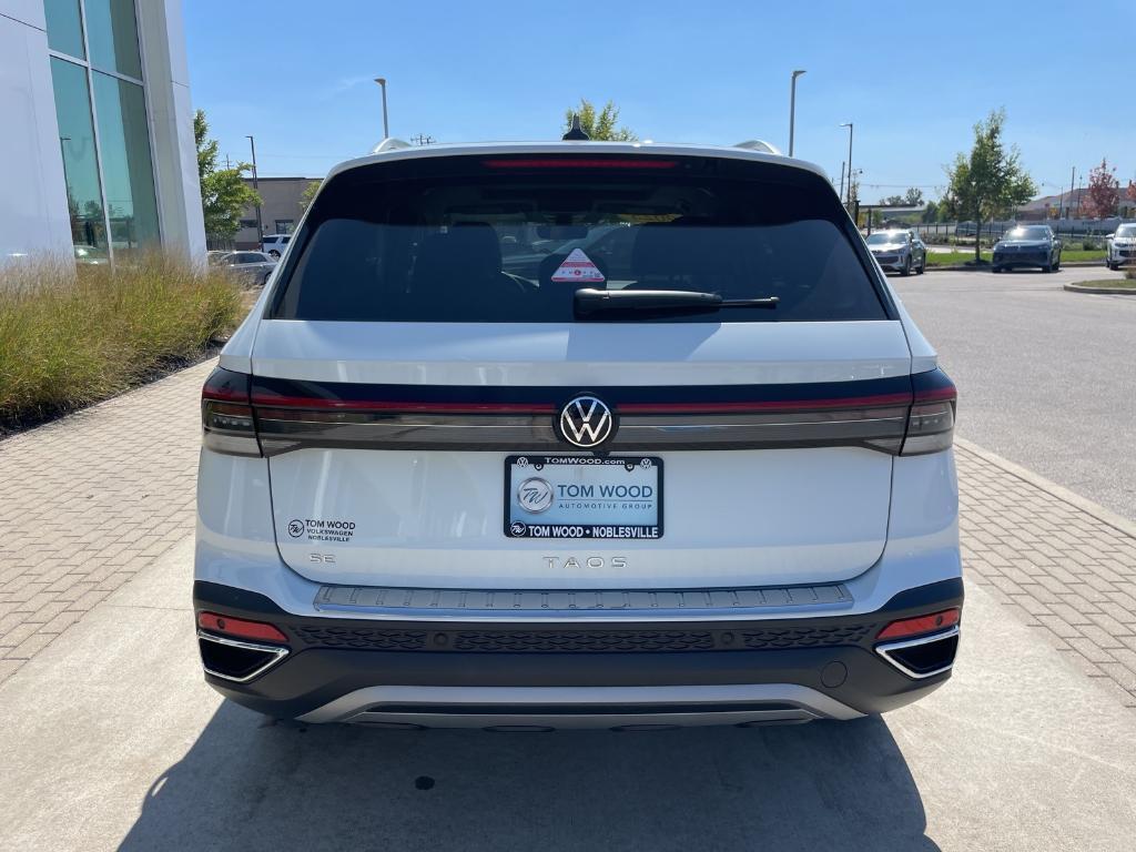 used 2025 Volkswagen Taos car, priced at $30,612