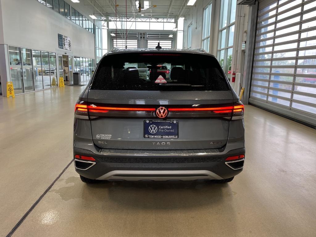 used 2025 Volkswagen Taos car, priced at $31,344