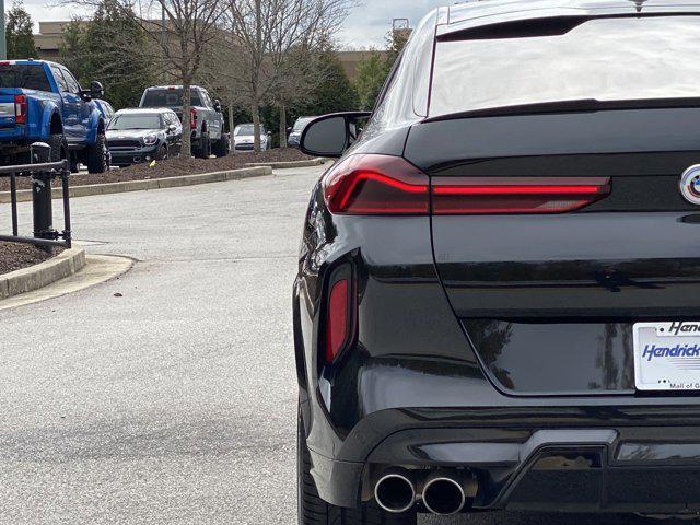 used 2023 BMW X6 M car, priced at $89,637