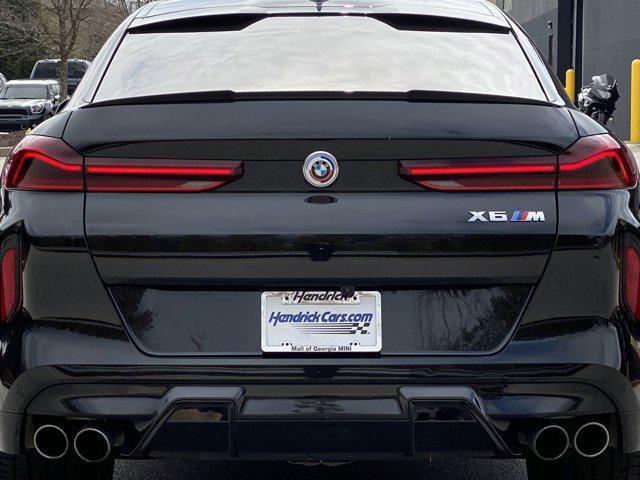 used 2023 BMW X6 M car, priced at $89,637