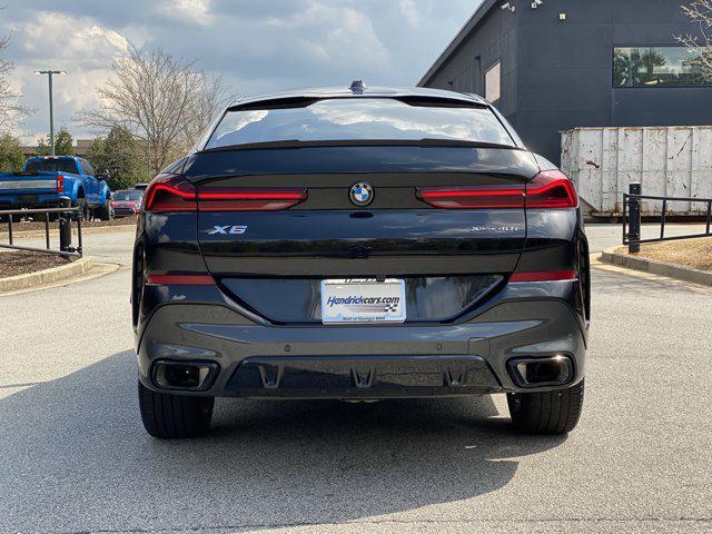 used 2024 BMW X6 car, priced at $79,988