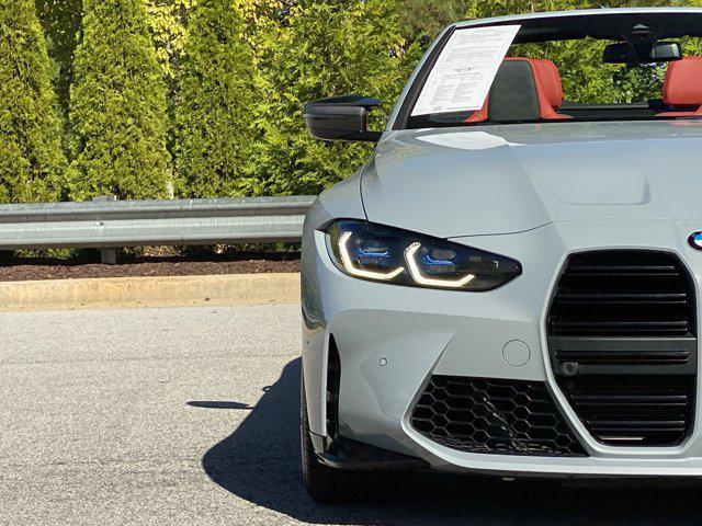 used 2022 BMW M4 car, priced at $75,000