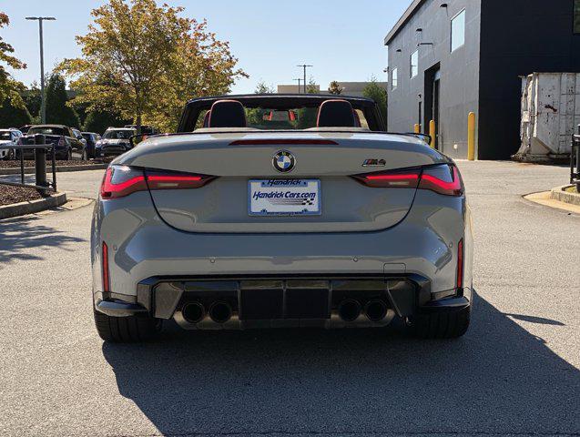 used 2022 BMW M4 car, priced at $75,000