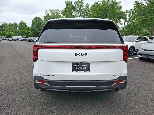 new 2025 Kia Carnival Hybrid car, priced at $51,470