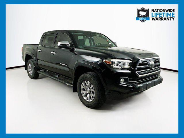 used 2018 Toyota Tacoma car, priced at $23,711