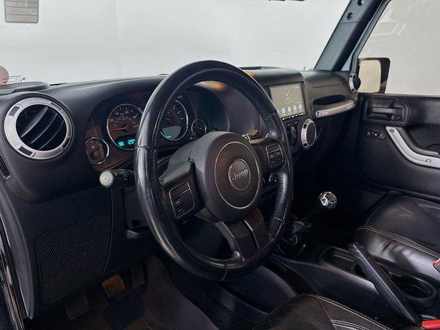 used 2015 Jeep Wrangler Unlimited car, priced at $18,571