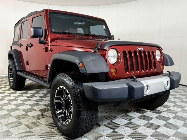 used 2010 Jeep Wrangler Unlimited car, priced at $13,990