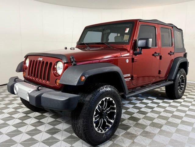 used 2010 Jeep Wrangler Unlimited car, priced at $13,990