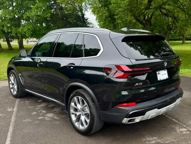 used 2024 BMW X5 car, priced at $64,950