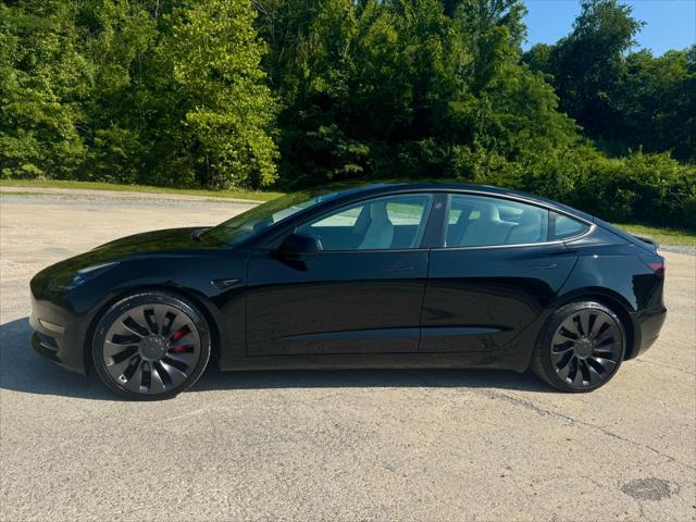 used 2022 Tesla Model 3 car, priced at $29,950