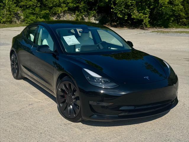 used 2022 Tesla Model 3 car, priced at $30,950