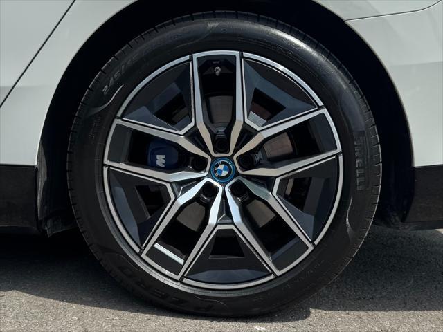 used 2024 BMW i5 car, priced at $53,950