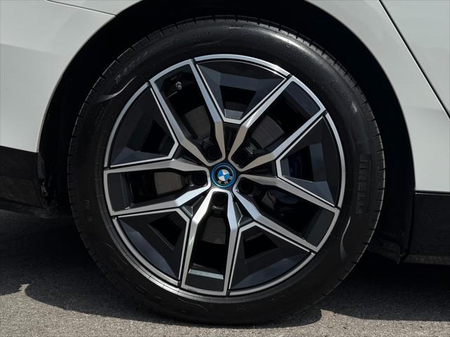 used 2024 BMW i5 car, priced at $53,950