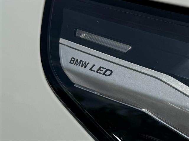used 2024 BMW i5 car, priced at $53,950