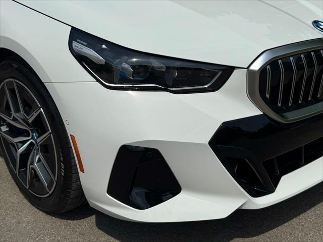 used 2024 BMW i5 car, priced at $53,950