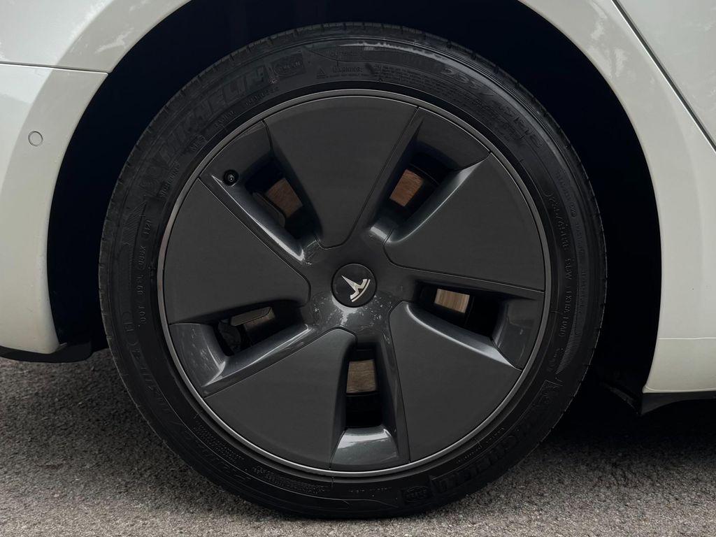 used 2022 Tesla Model 3 car, priced at $27,950