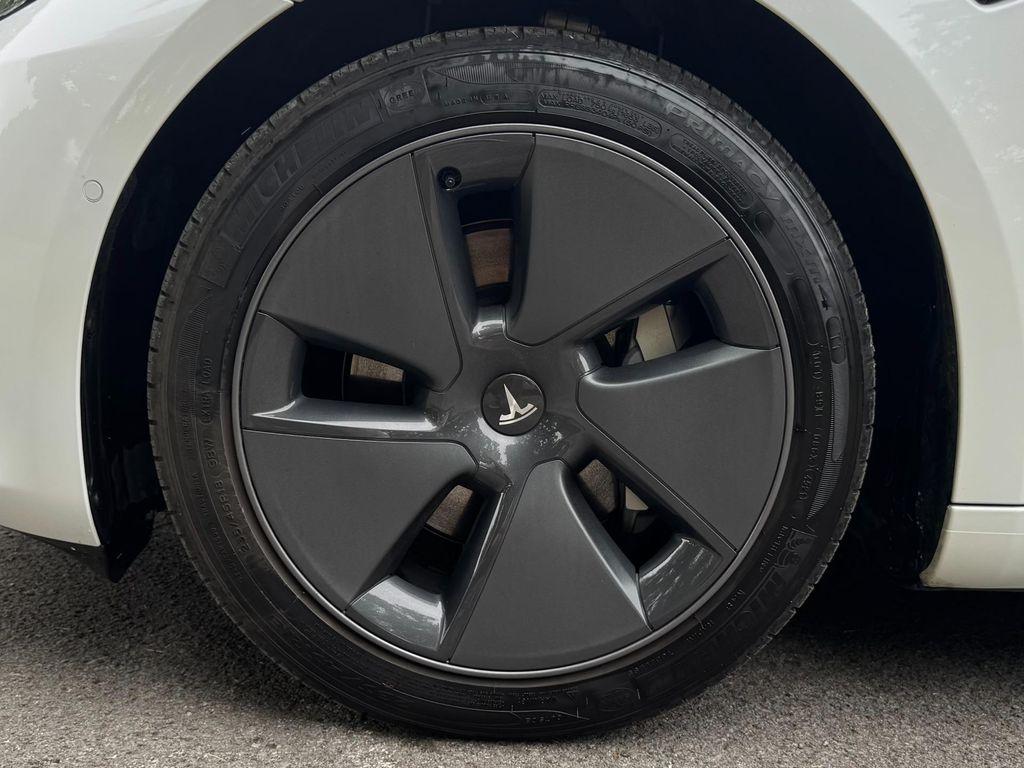 used 2022 Tesla Model 3 car, priced at $27,950