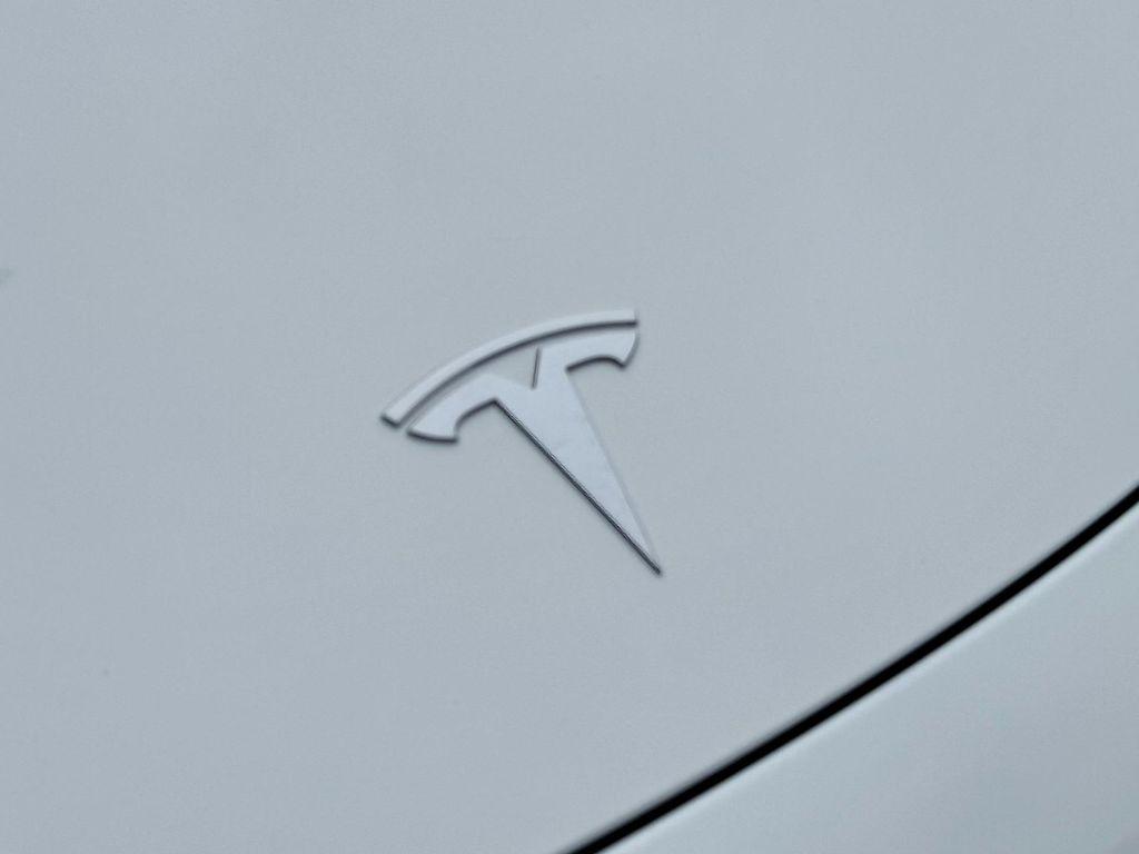 used 2022 Tesla Model 3 car, priced at $27,950