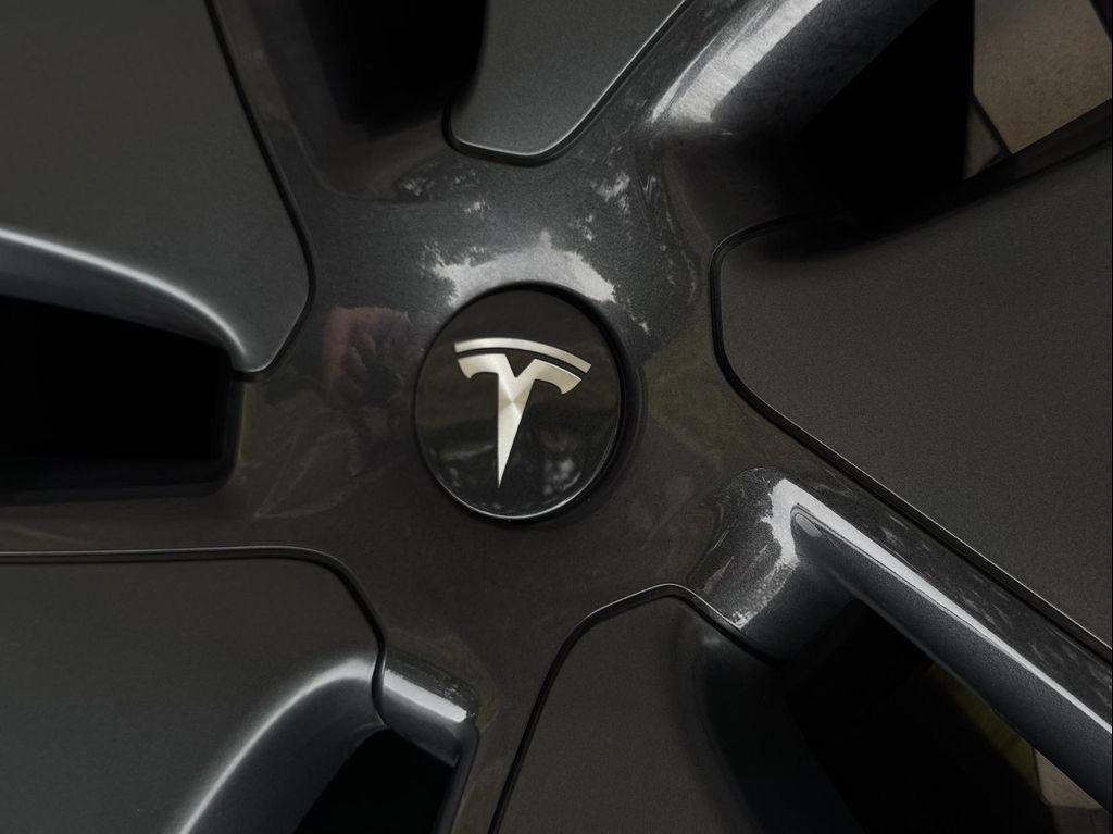 used 2022 Tesla Model 3 car, priced at $27,950