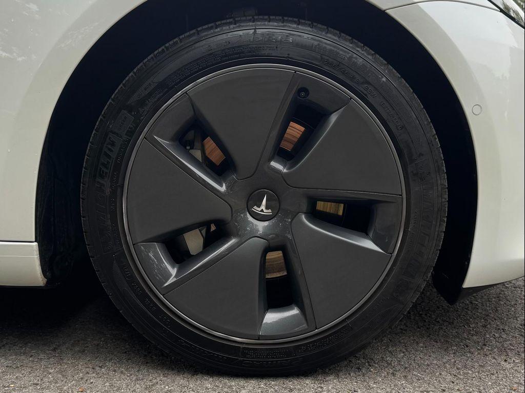 used 2022 Tesla Model 3 car, priced at $27,950