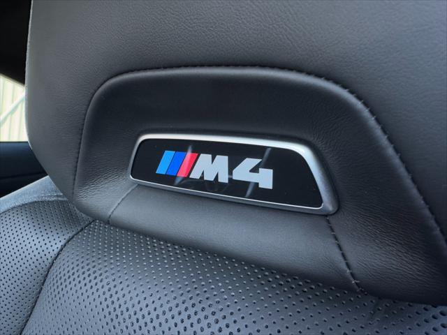 used 2024 BMW M4 car, priced at $79,950