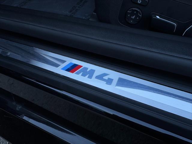 used 2024 BMW M4 car, priced at $79,950