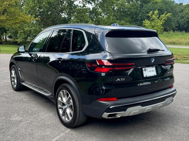 used 2024 BMW X5 car, priced at $56,950