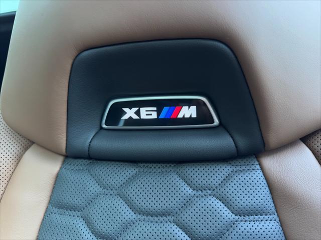 used 2024 BMW X6 M car, priced at $124,950