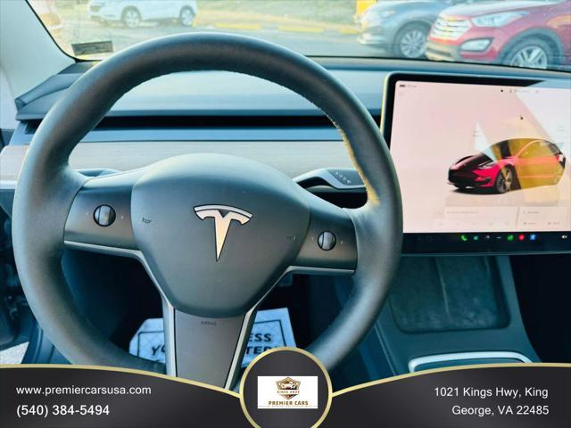 used 2023 Tesla Model 3 car, priced at $19,999