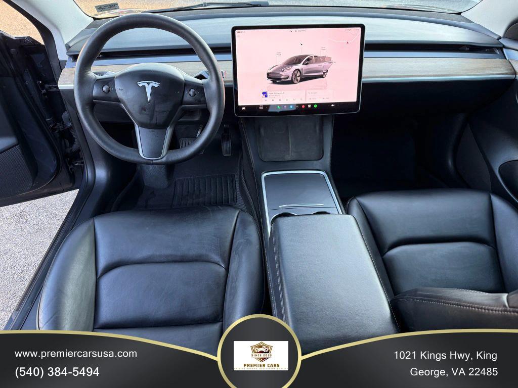 used 2023 Tesla Model 3 car, priced at $19,499