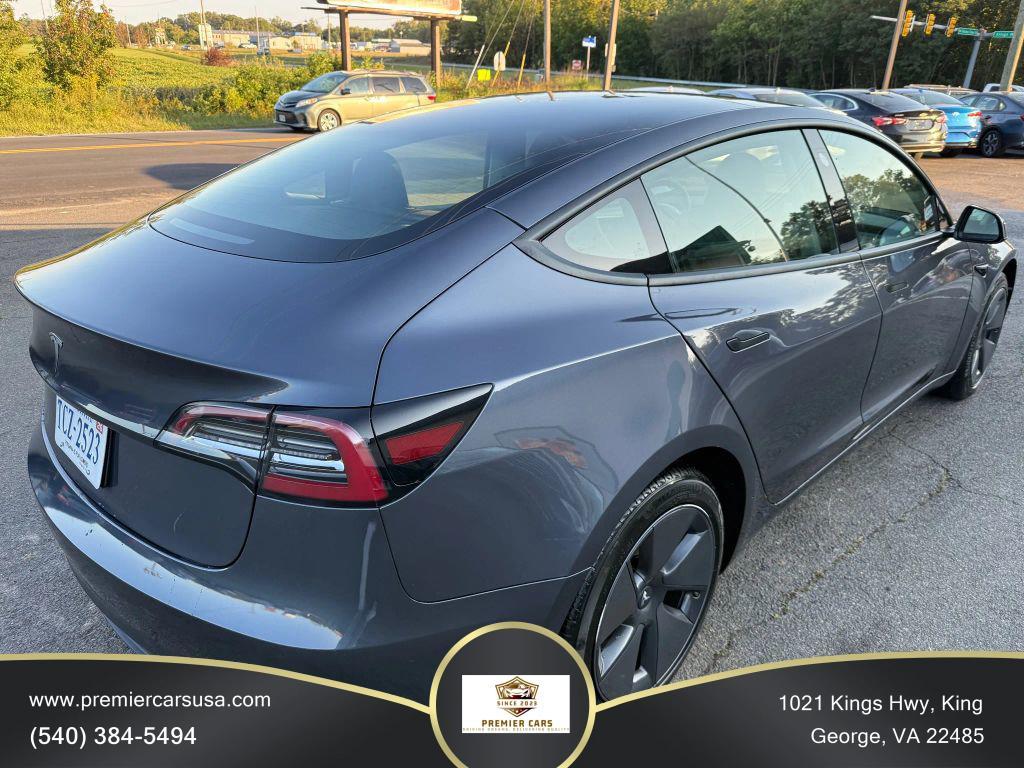 used 2023 Tesla Model 3 car, priced at $19,499