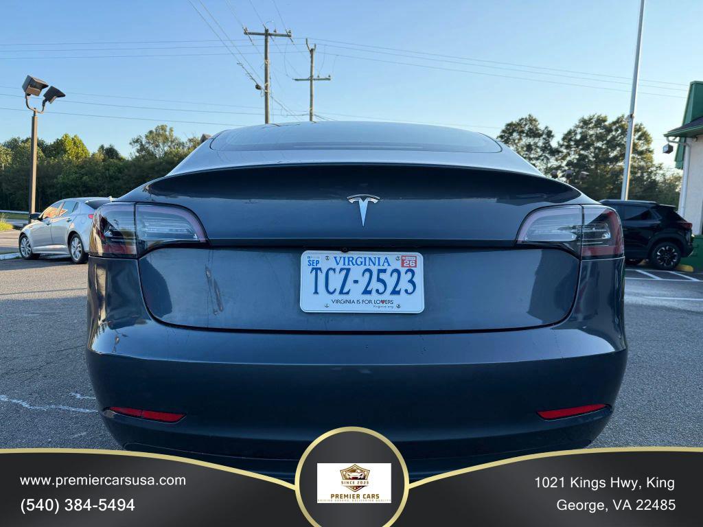 used 2023 Tesla Model 3 car, priced at $19,499