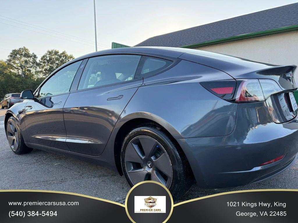 used 2023 Tesla Model 3 car, priced at $19,499