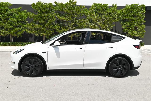 used 2024 Tesla Model Y car, priced at $34,845