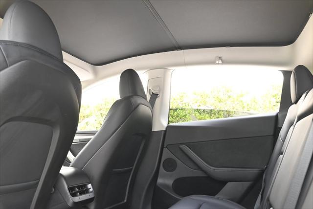 used 2024 Tesla Model Y car, priced at $34,845