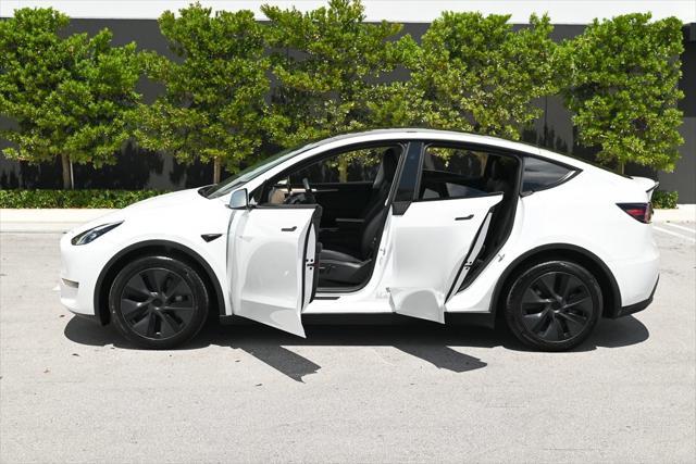 used 2024 Tesla Model Y car, priced at $34,845