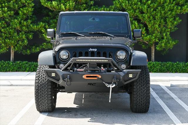 used 2018 Jeep Wrangler JK Unlimited car, priced at $21,990