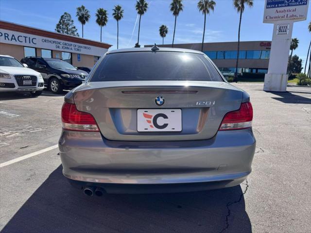 used 2009 BMW 128 car, priced at $6,990