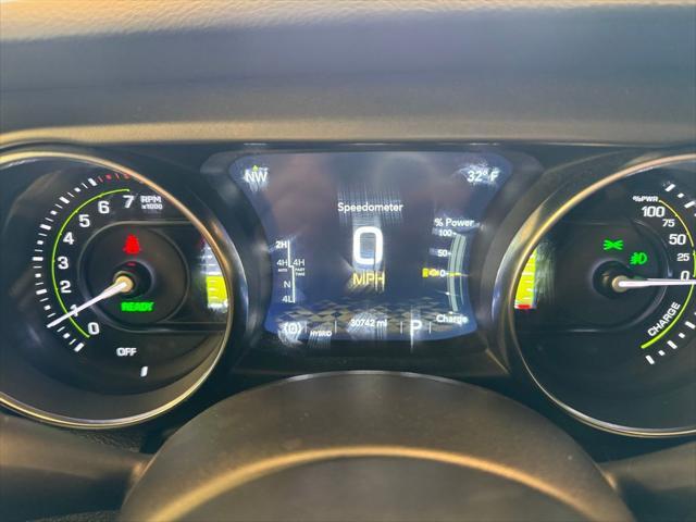 used 2023 Jeep Wrangler 4xe car, priced at $32,997